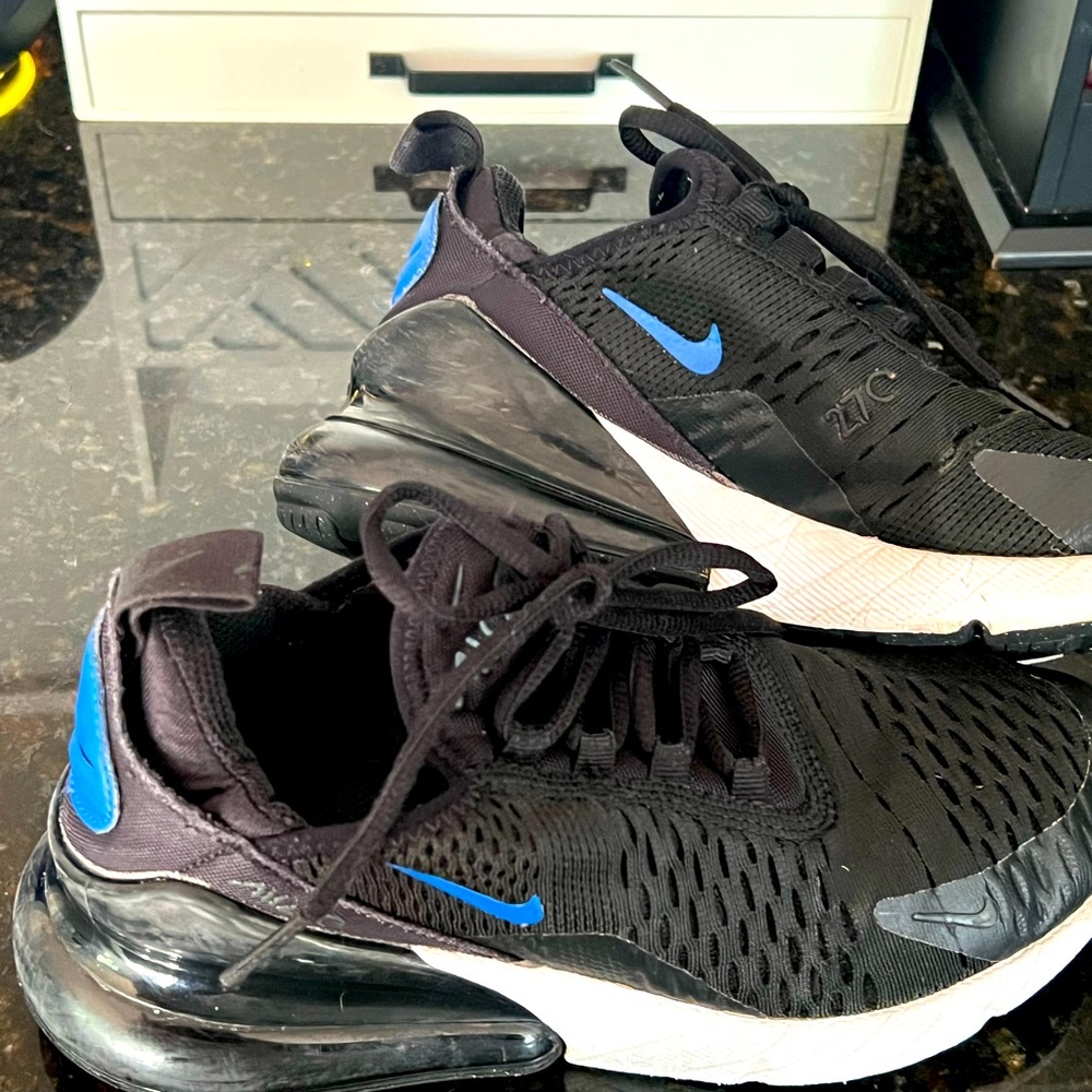 Boys’ Nike 4Y blue and black tennis shoes